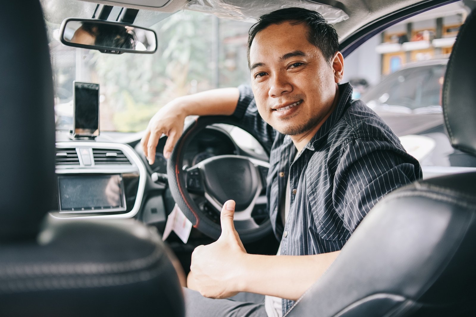 Taxi Driver Giving Thumb Up